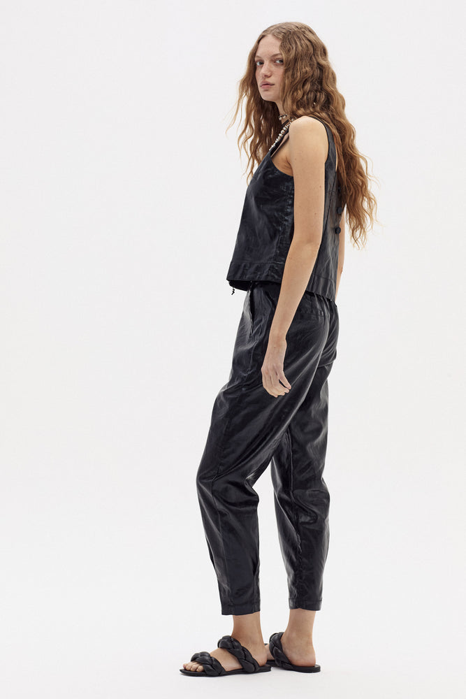 
                  
                    Pantalón Anya en Lino Metalizado - Negro
                  
                