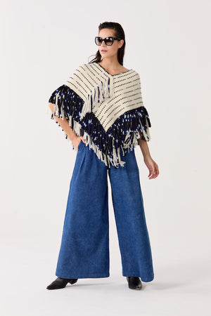 
                  
                    Poncho Fun en lana merino - Natural con Azul
                  
                